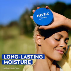 Hands applying NIVEA Creme for daily moisturization and smooth skin.