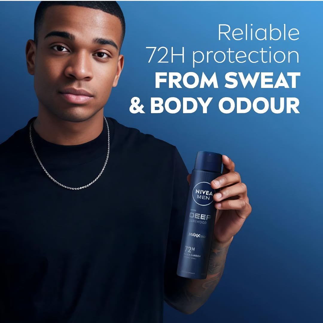 Close-up of NIVEA Men Deep Black Carbon Darkwood bottle emphasizing charcoal infusion.