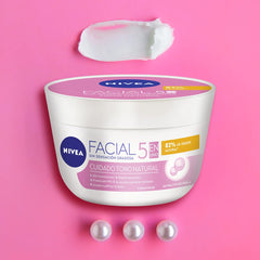 NIVEA Natural Brightening Cream being applied to the face