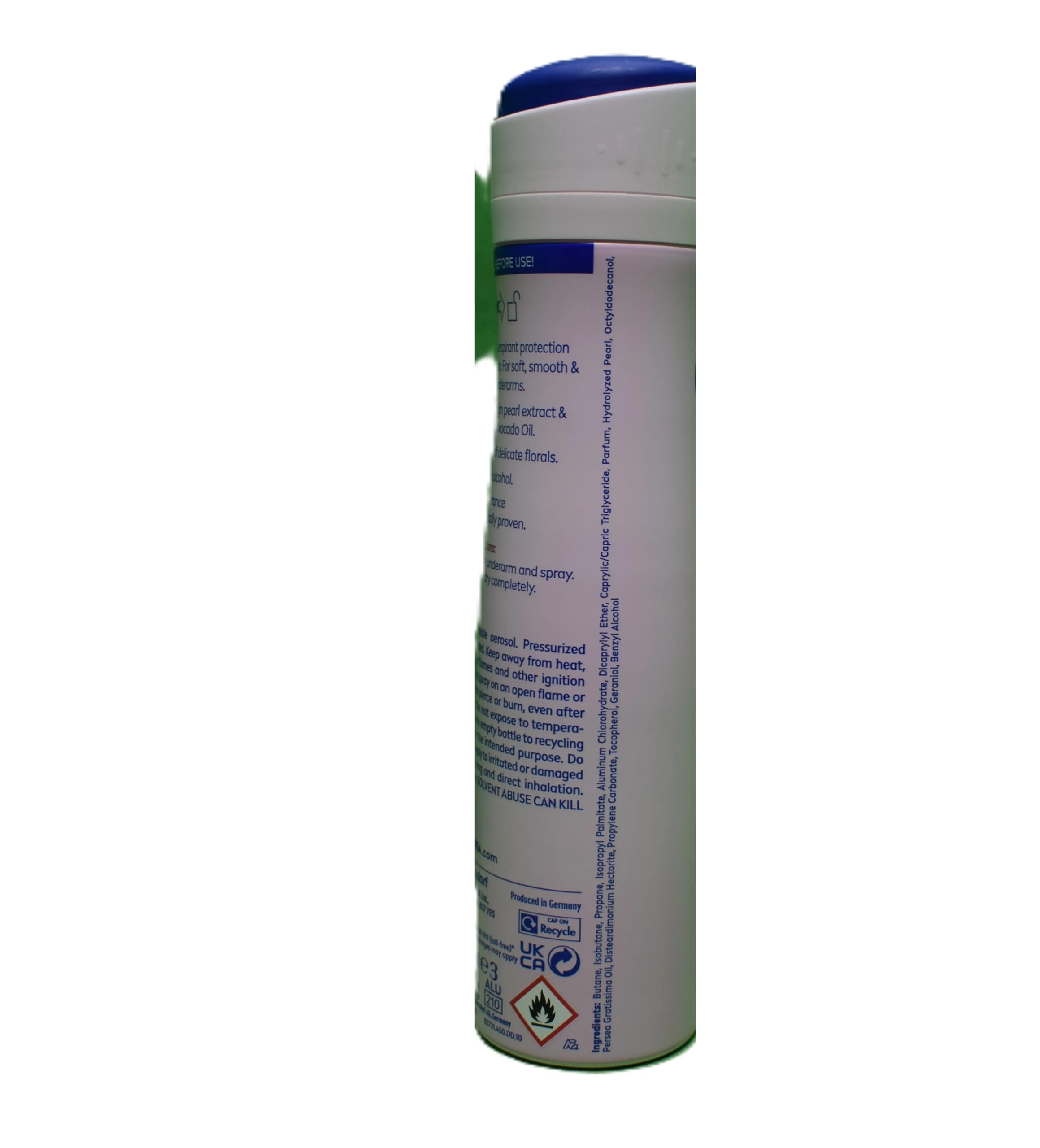 NIVEA Pearl Beauty underarm application showing quick-dry spray.