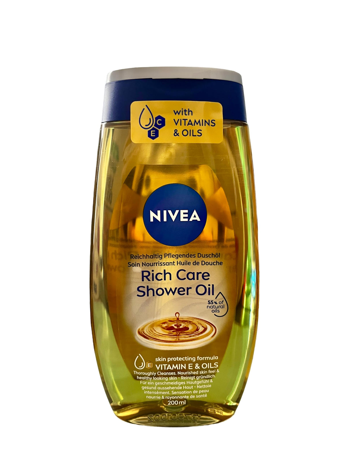 NIVEA Shower Oil Natural Caring bottle pour shows silky texture for dry skin