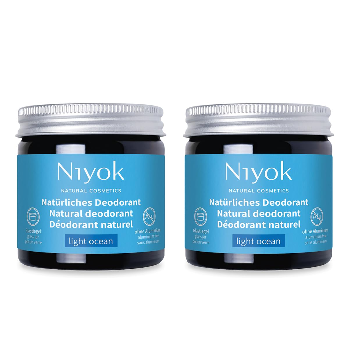 Niyok Light Ocean deodorant jar in brown glass packaging for eco-friendly daily use.
