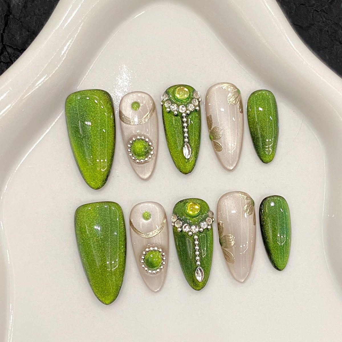 NLSJMP hand-painted almond nails show elegant 3D detail for a salon-like finish.