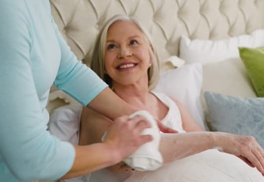 Person applies No-Rinse body wash for a fast cleansing in use.