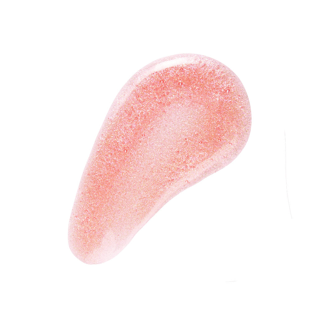 No7 High Shine Lip Gloss Pink Slip swatch on lips with shimmer