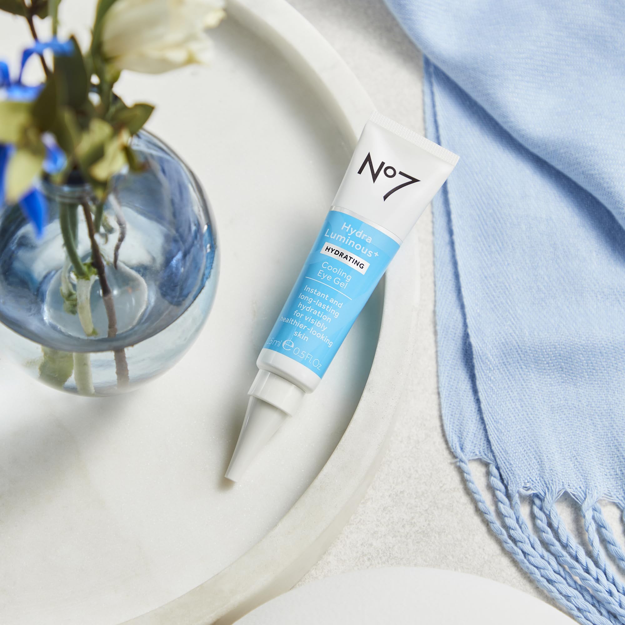 No7 HydraLuminous+ application around the eyes demonstrates gentle hydration.