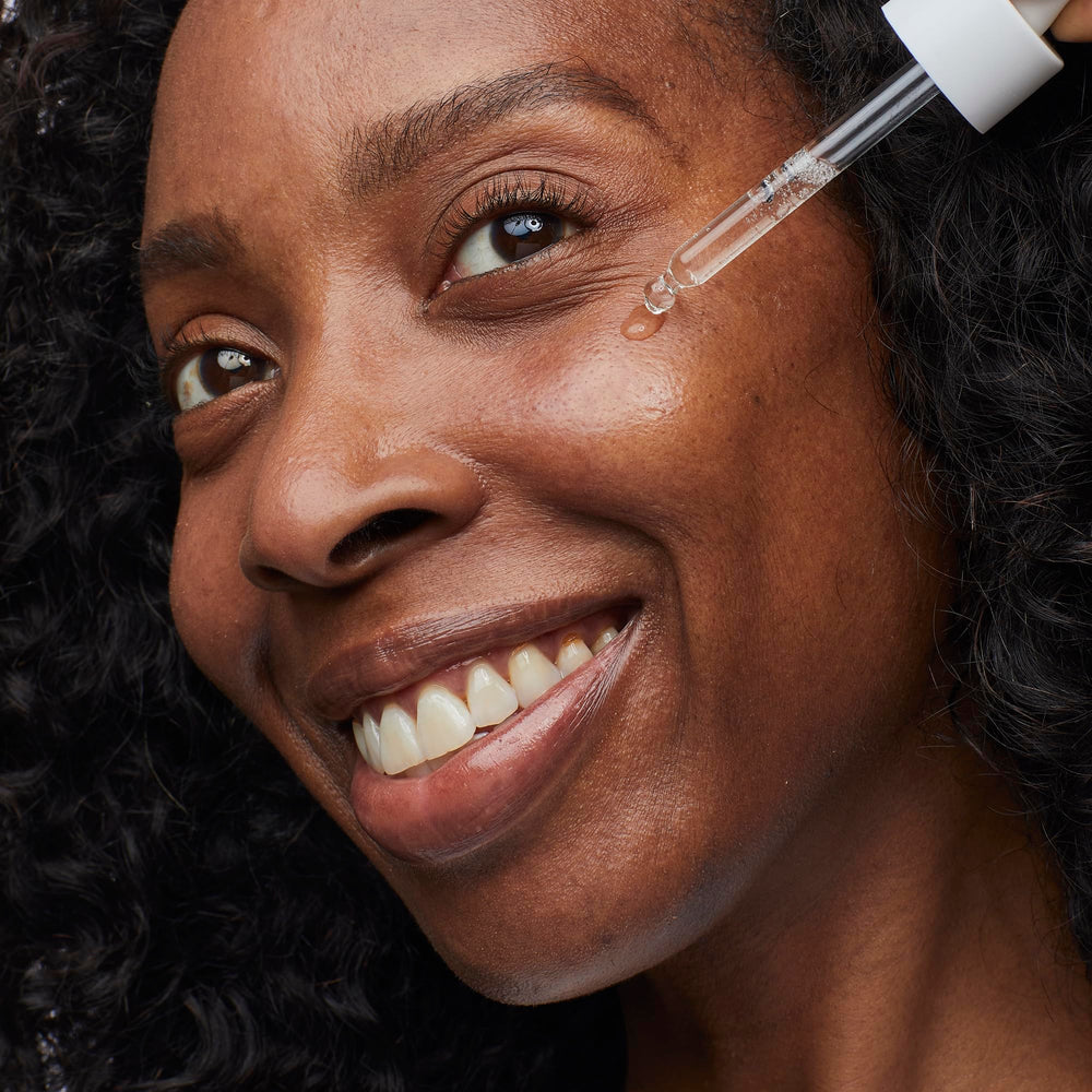 No7 HydraLuminous Pollution Shield graphic suggesting pollutant protection