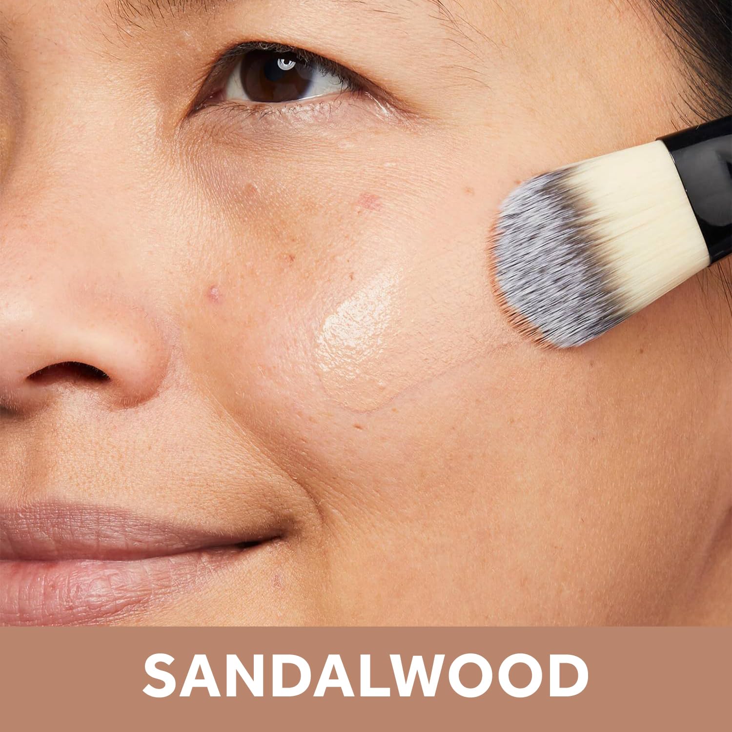 No7 Lift & Luminate dewy base swirl demonstrates luminous finish on skin.