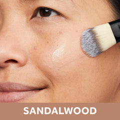 No7 Lift & Luminate dewy base swirl demonstrates luminous finish on skin.