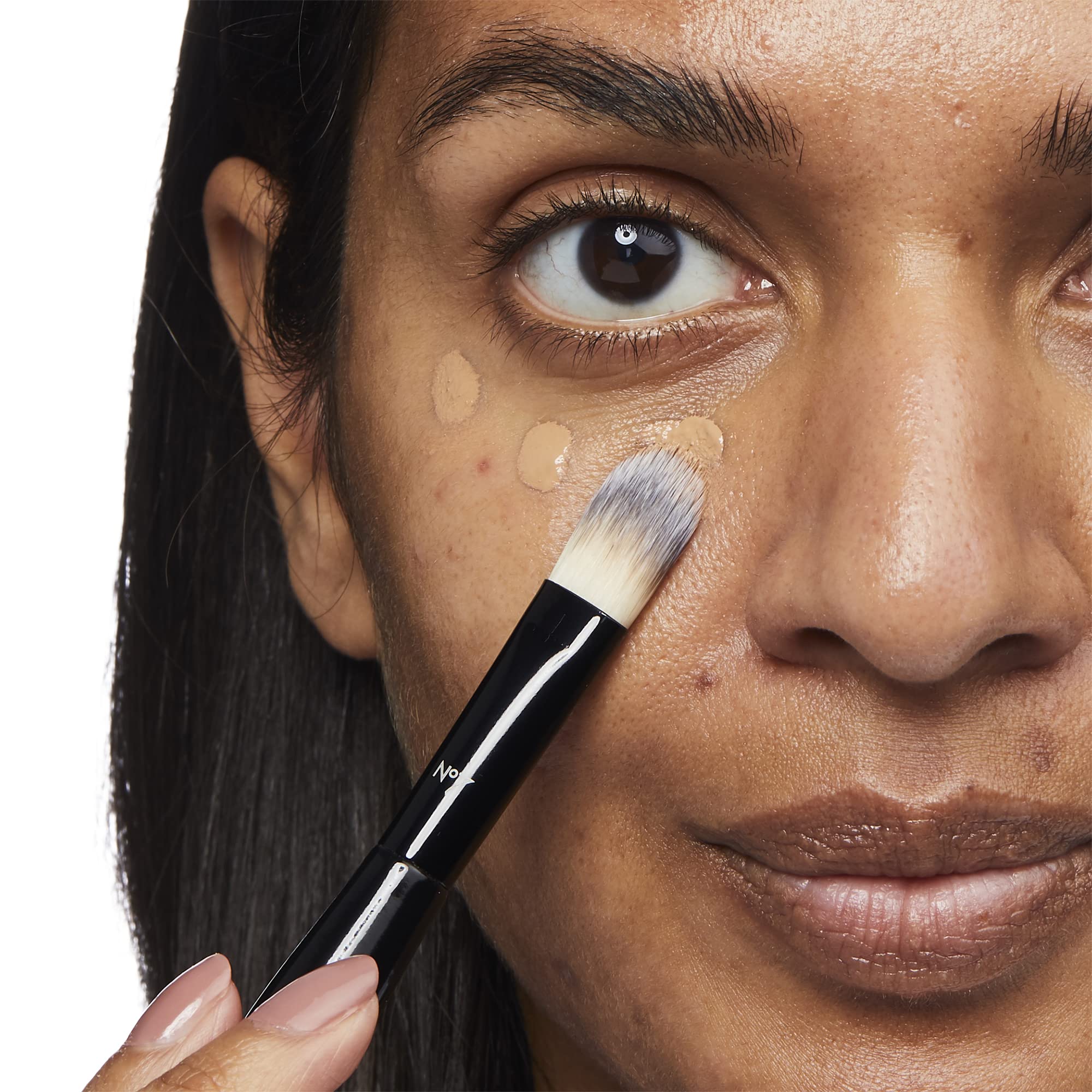 No7 Lift & Luminate close-up texture highlights buildable coverage and glowing finish.