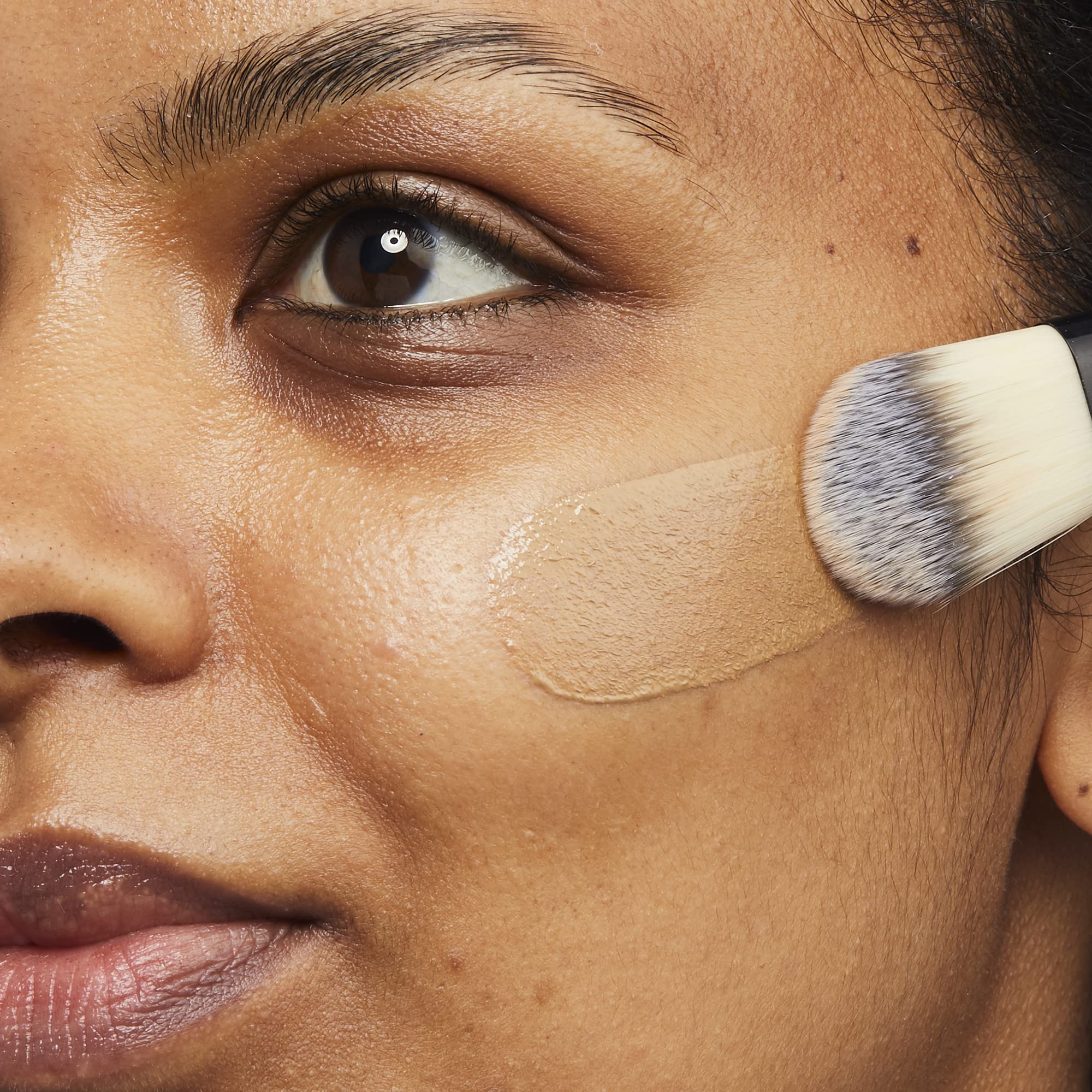 No7 foundation being applied on cheek for natural finish