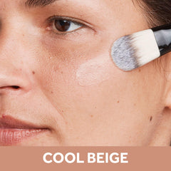 No7 Restore & Renew foundation swirls reveal creamy texture.
