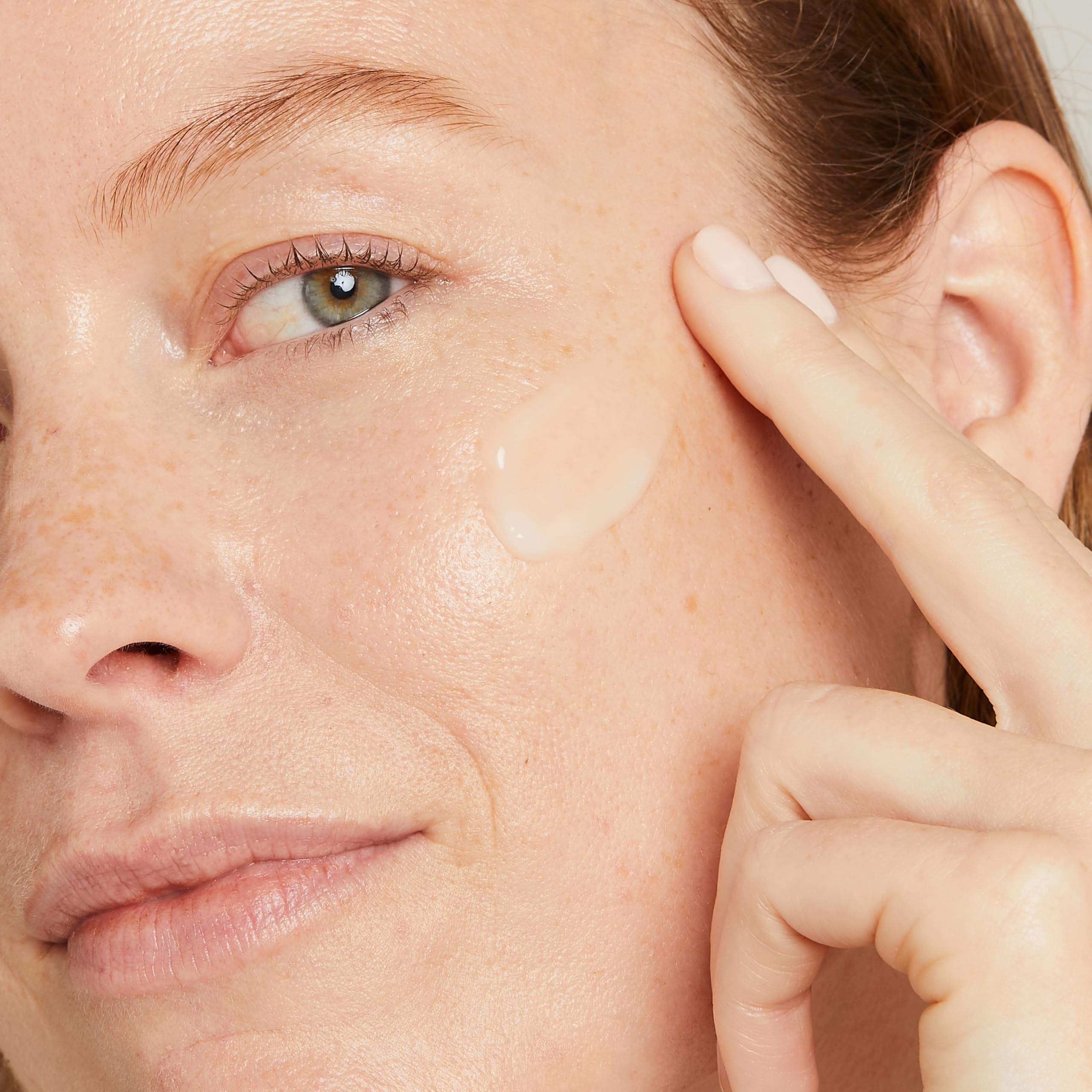 No7 Restore and Renew neck application closeup highlighting gentle firming for the neckline.