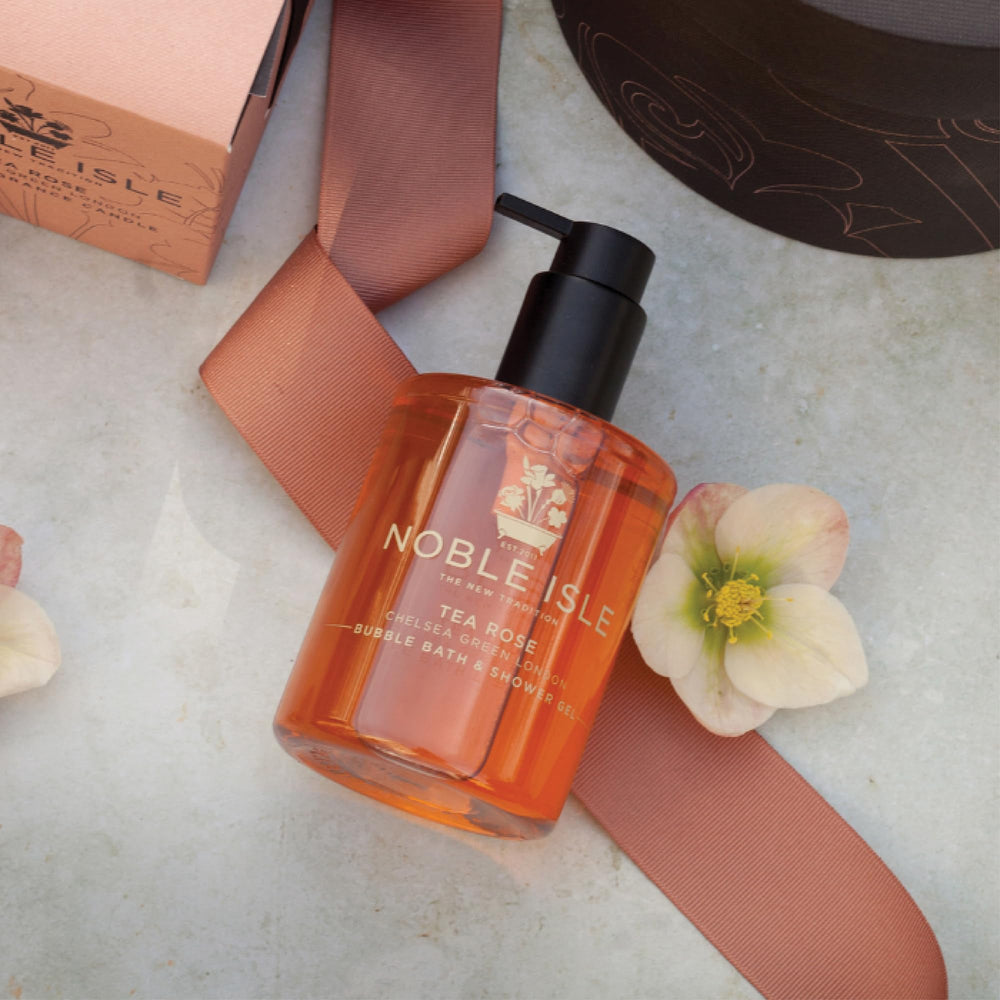 Bottle label of Noble Isle Tea Rose signaling vegan, paraben-free care