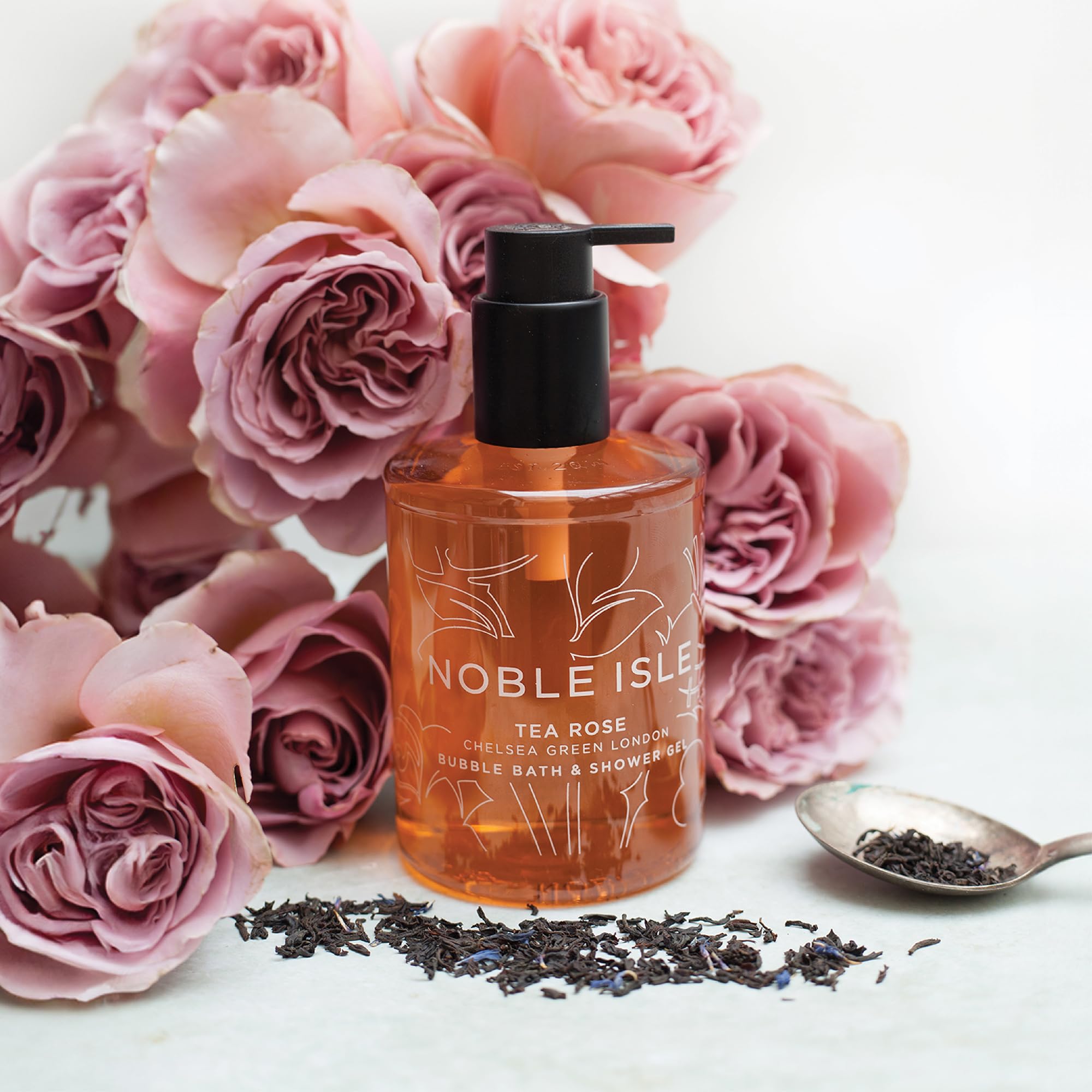 Foam closeup of Noble Isle Tea Rose for spa-like wash texture