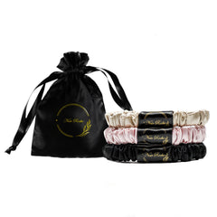 Noir Roche Silk Scrunchies set of three colors for versatile styling and gentle hold.