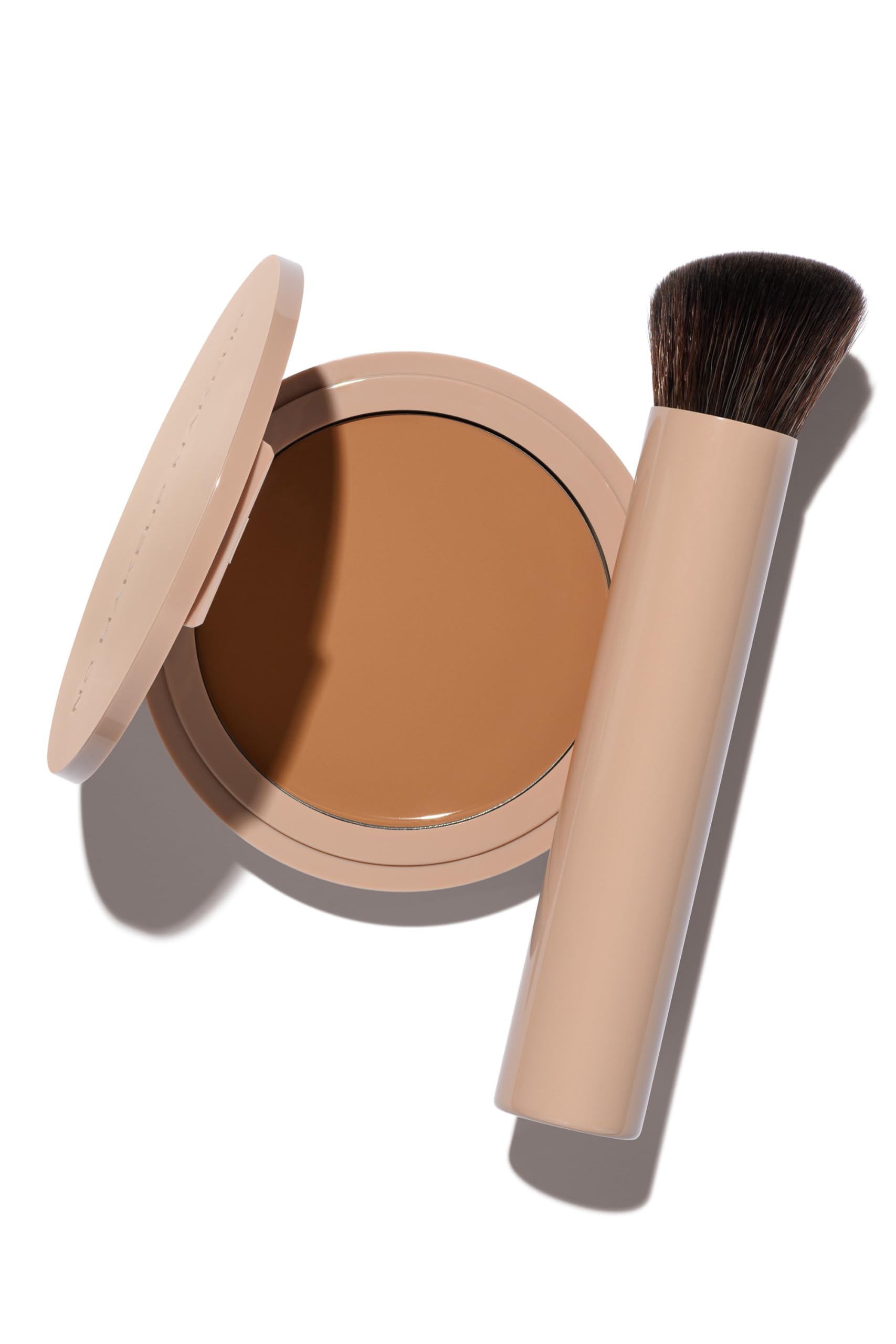 No Makeup Makeup Foundation Tan bottle demonstrates skin-tone adaptive coverage for a natural finish.