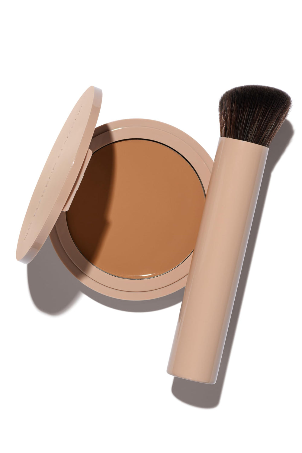 No Makeup Makeup Foundation Tan bottle demonstrates skin-tone adaptive coverage for a natural finish.