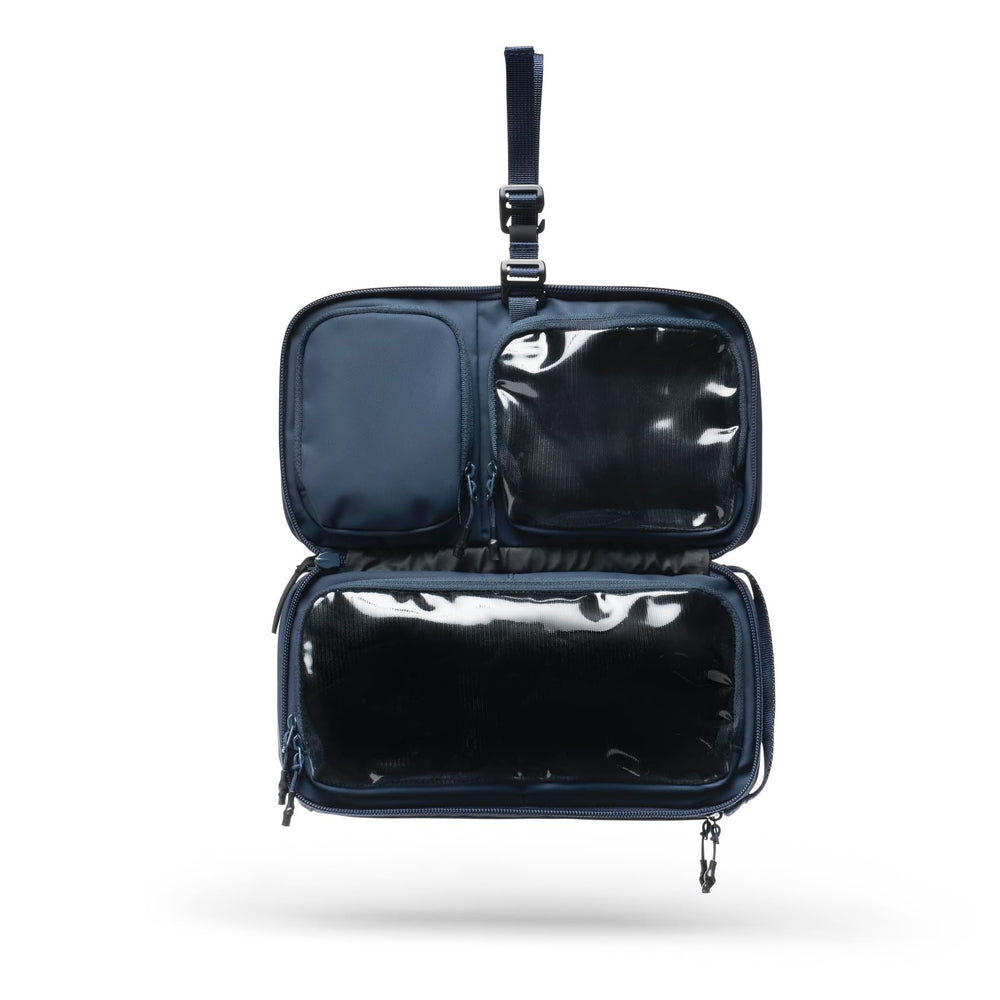 NOMATIC Toiletry Bag makeup organization area keeps cosmetics secure and accessible.