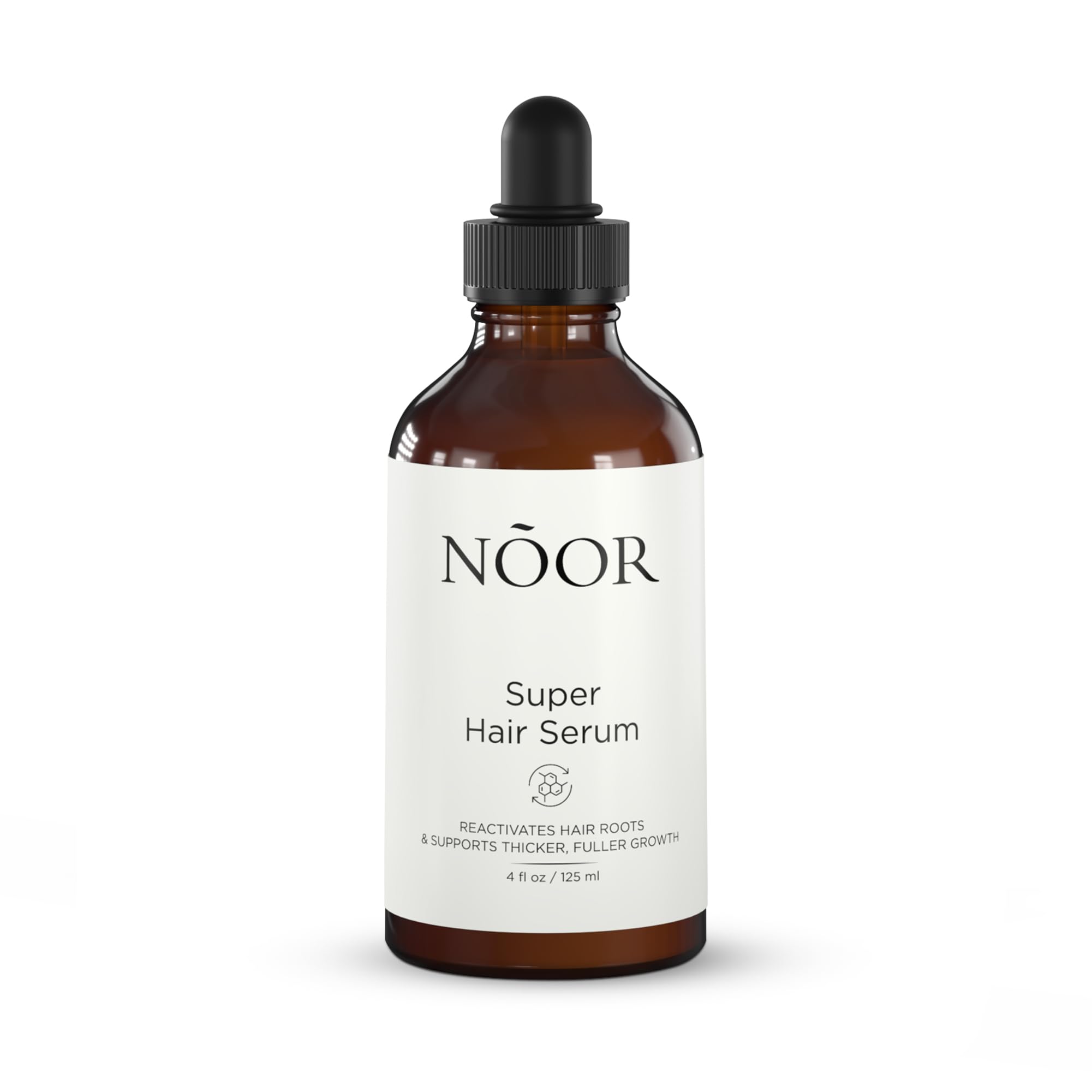 NOOR HAIR Growth Serum bottle close-up showing growth-supporting formula.