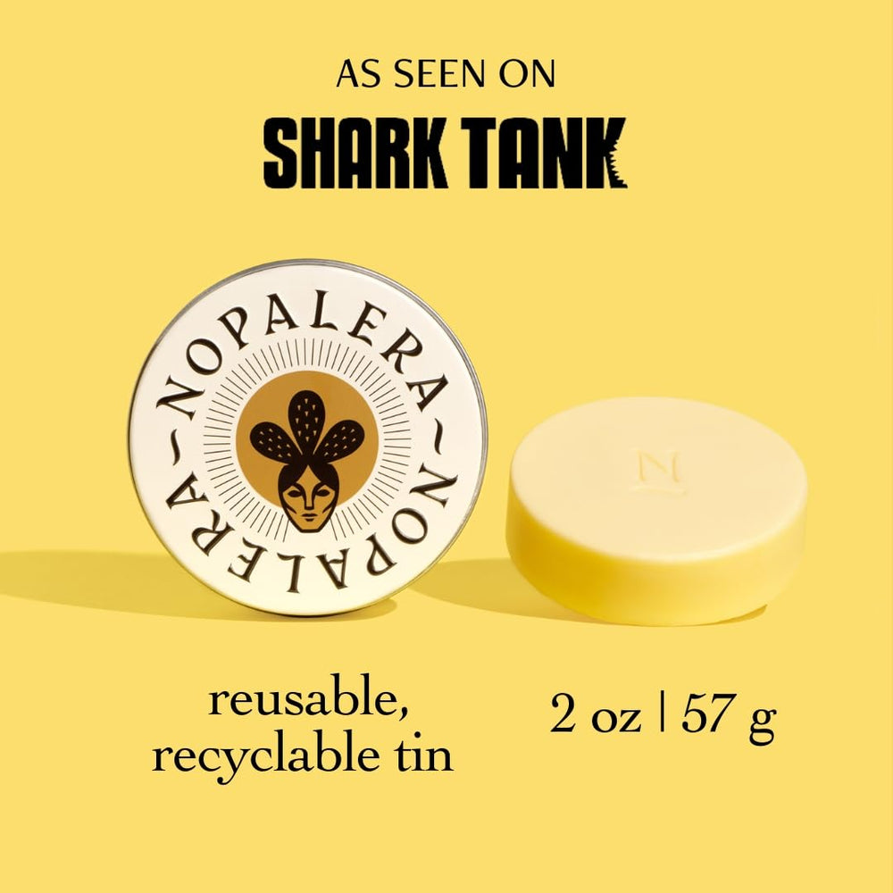 Close-up of Nopalera Citrus Lotion Bar packaging in tin