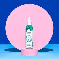 Not Your Mother's All Eyes On Me hair after spray shows added shine and smoother texture.