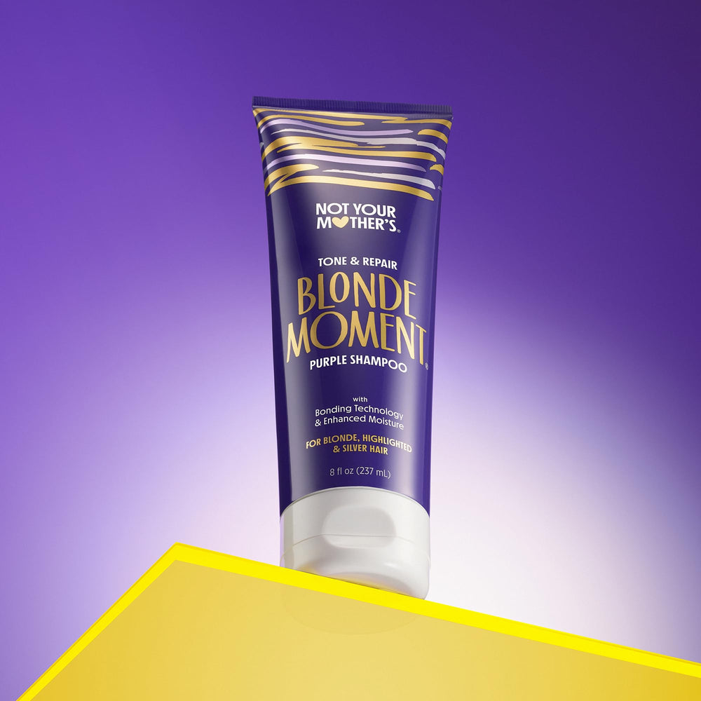 Not Your Mother's Blonde Moment purple shampoo bottle close-up highlighting violet pigments