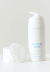 Nothing Fits But Oxygen Bomb dual texture application highlights gentle exfoliation for smoother skin.
