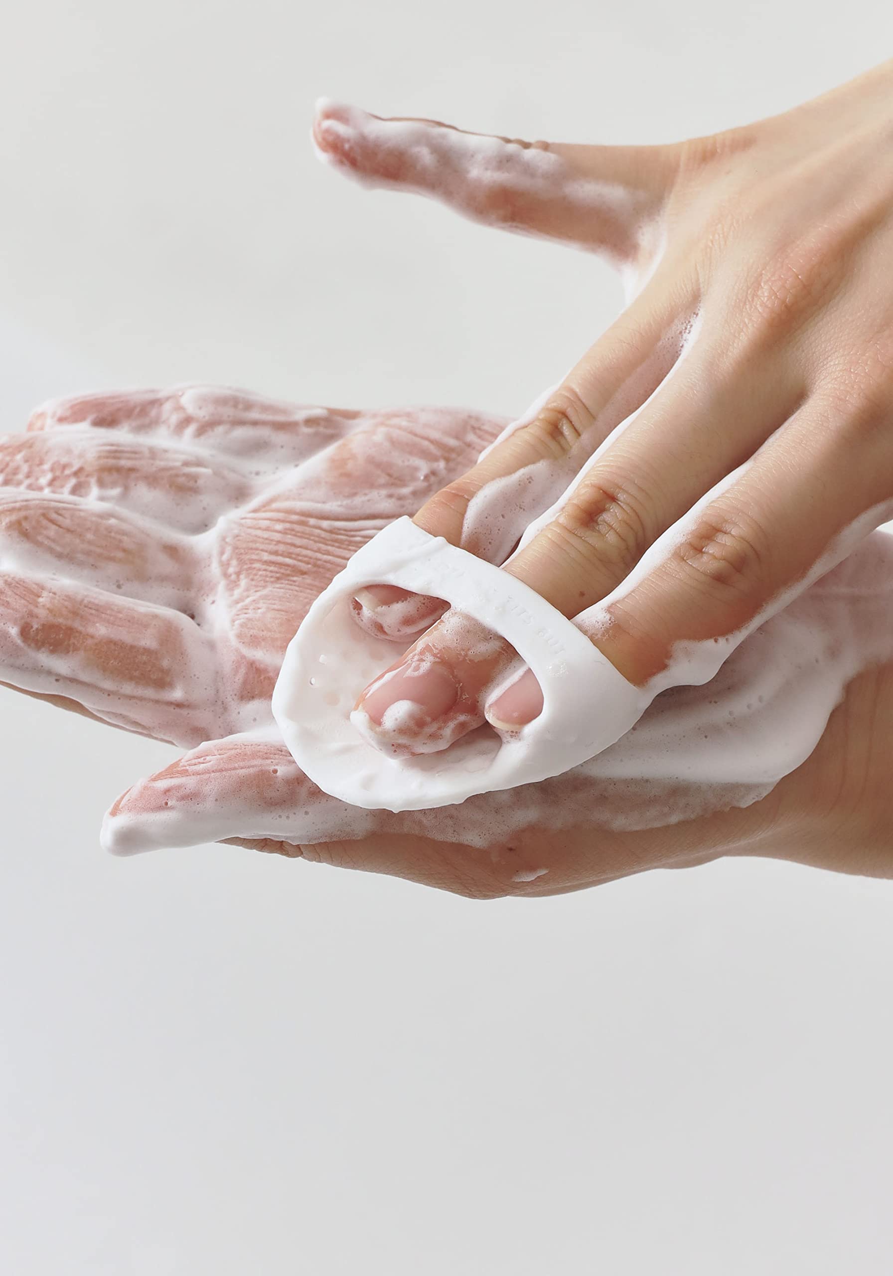 Nothing Fits But Oxygen Bomb face cleansing application captures a soothing circular massage.