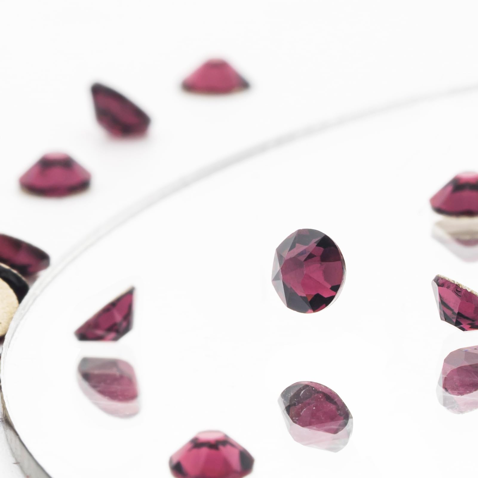 Novani rhinestones feature metallic back coating that reflects light for sparkle.