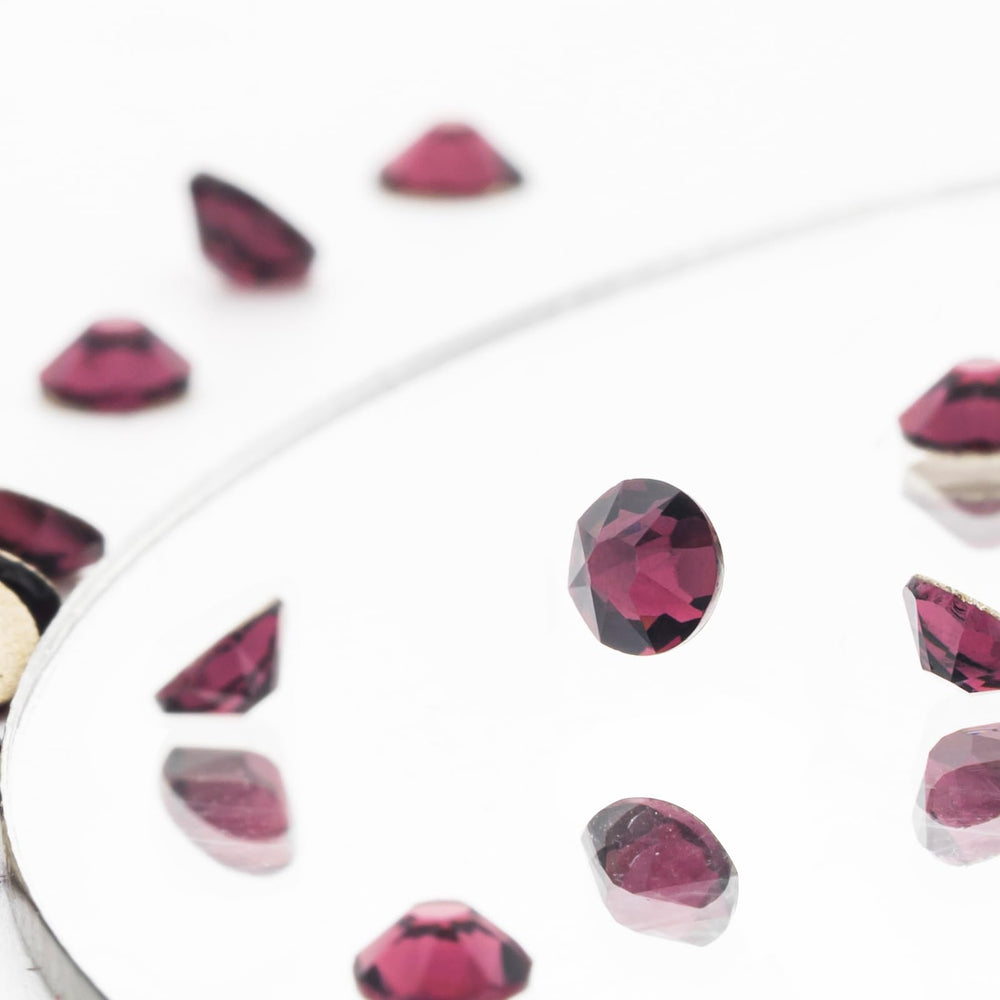 Novani rhinestones feature metallic back coating that reflects light for sparkle.