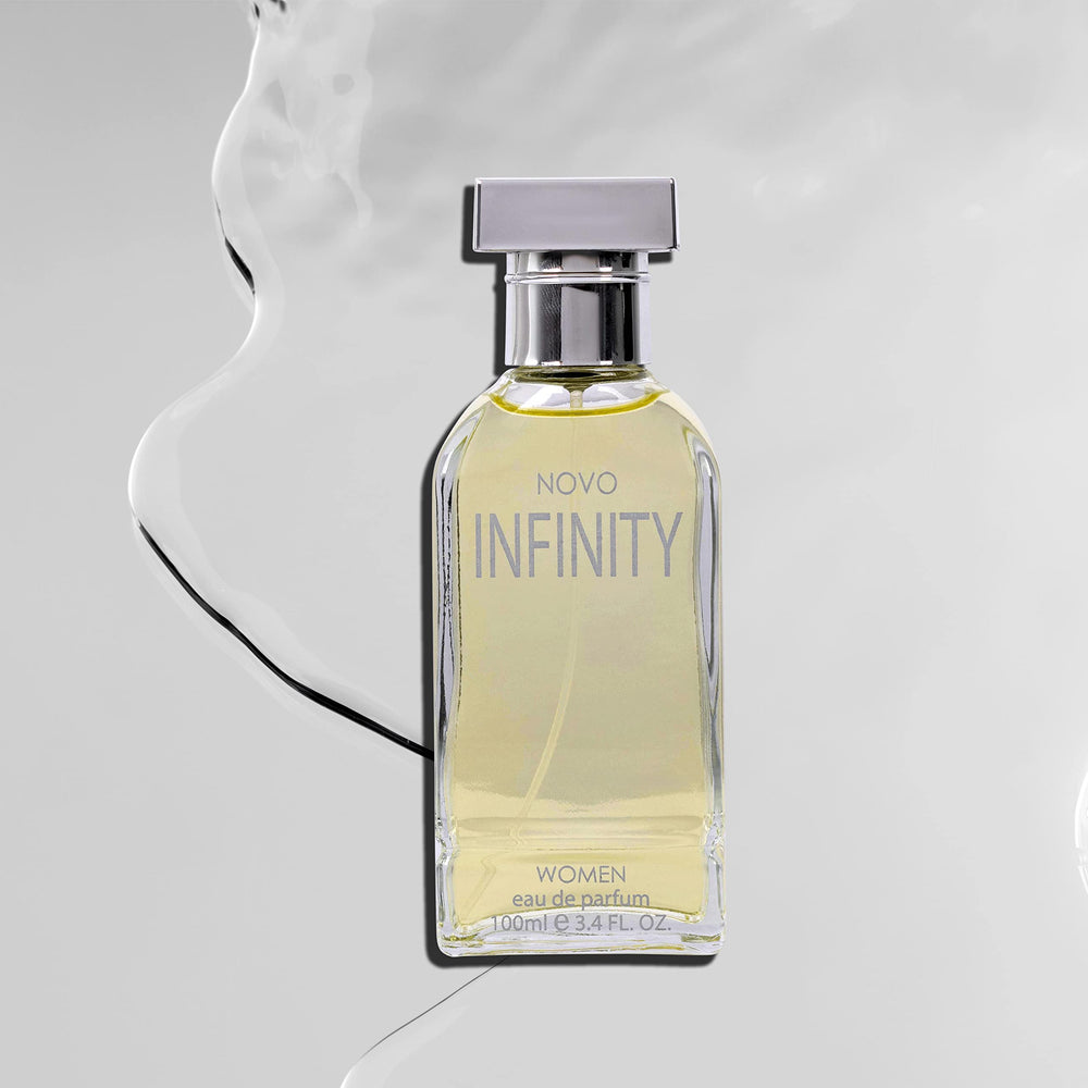 NovoGlow Infinity gift-ready box and bottle on a vanity surface.