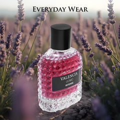 NovoGlow Valencia UOMO Intense spray bottle in action suggests long-lasting scent trail.