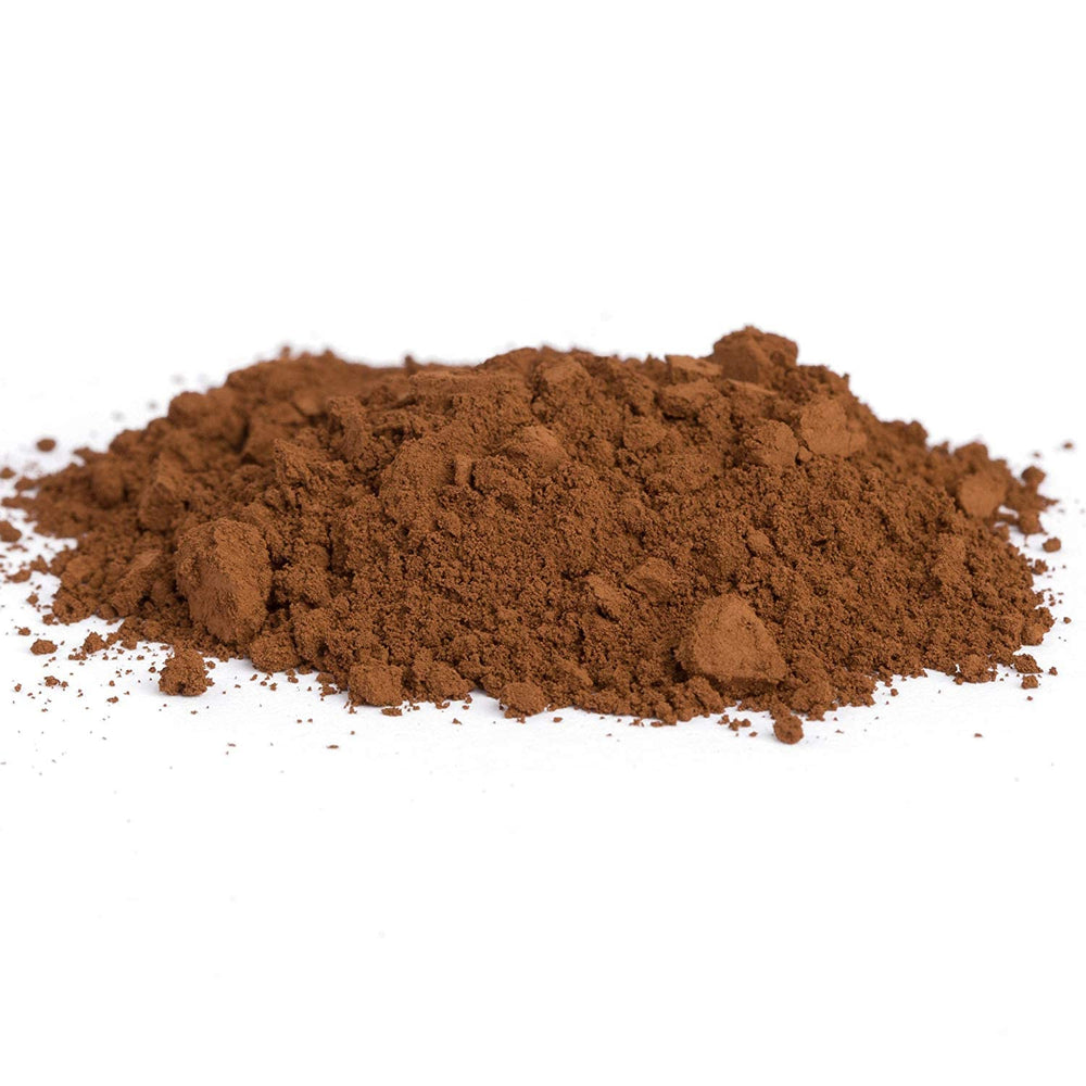 NuBeauti powder dusting to conceal roots between salon visits with natural finish.