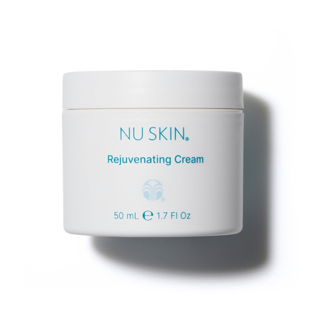 Nu Skin Rejuvenating Cream bottle closeup highlighting hydrating formula for dry skin.