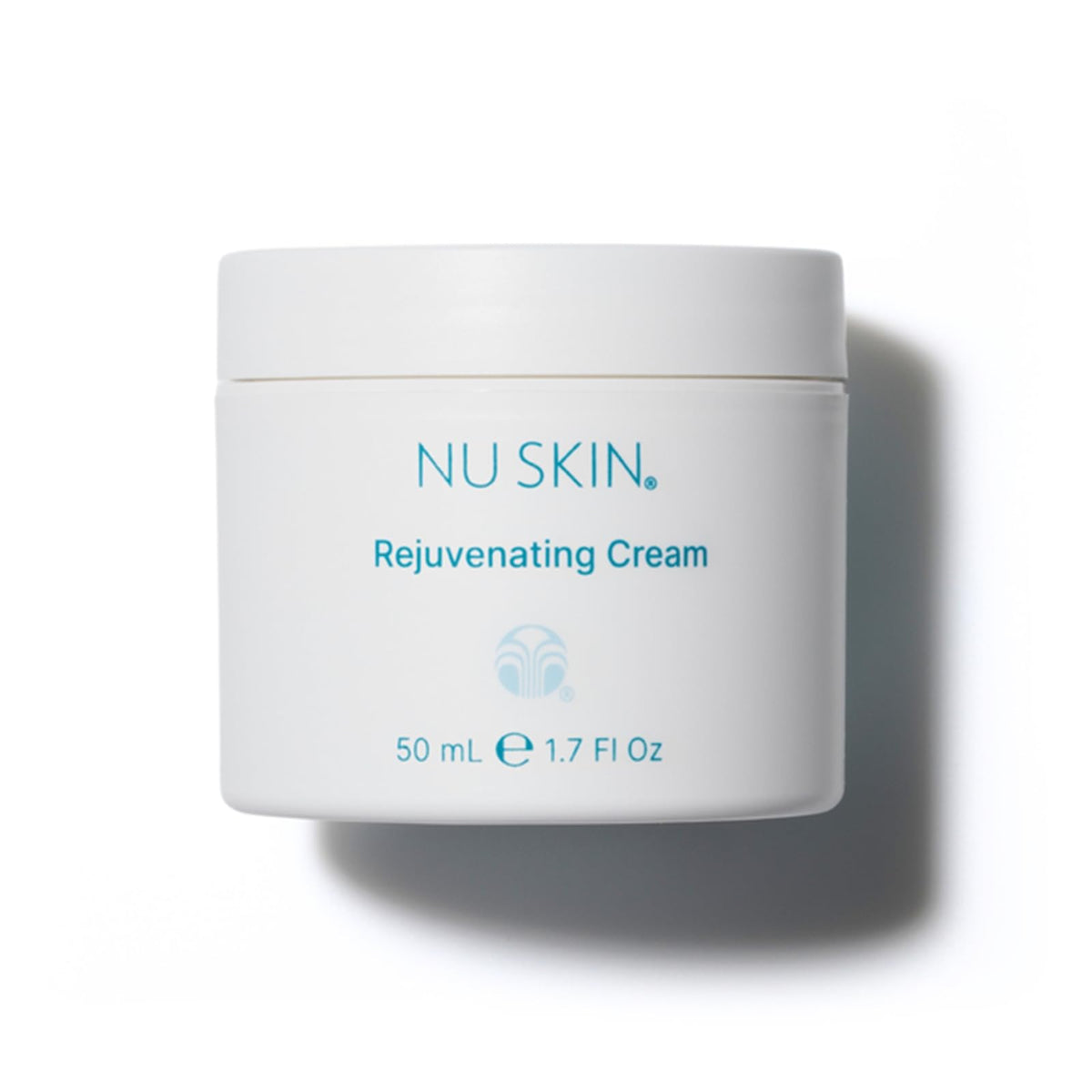 Nu Skin Rejuvenating Cream bottle closeup highlighting hydrating formula for dry skin.