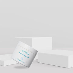 Hands applying Nu Skin Rejuvenating Cream for day or night use