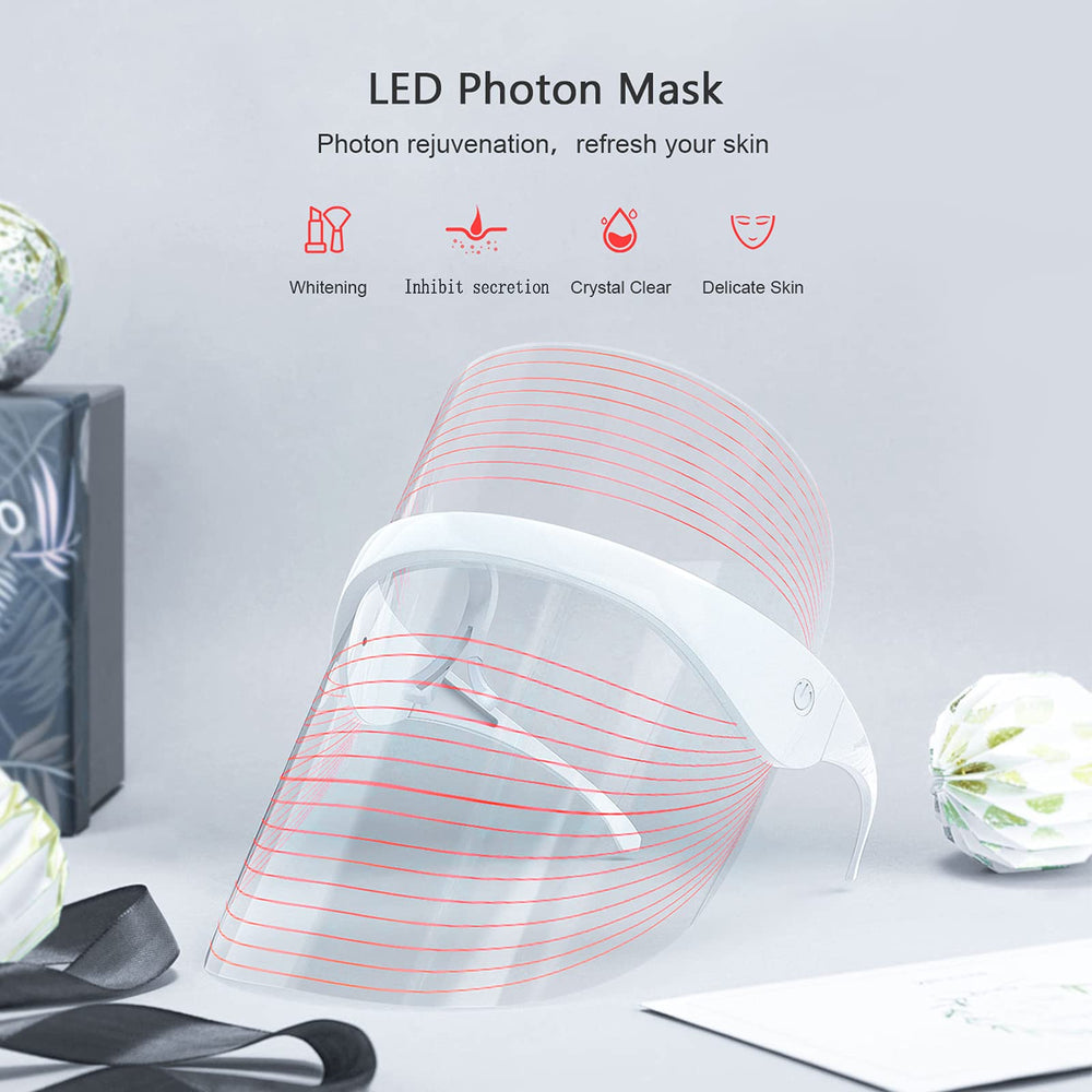 NUFR LED face mask emitting blue light on the face for oil control testing