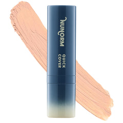 NuNorm foundation concealer stick twisted up for precise, buildable coverage.