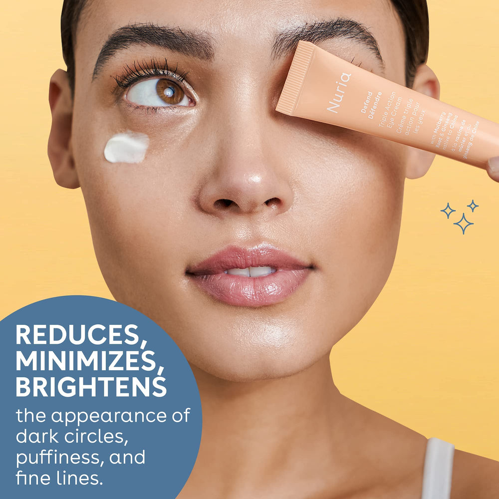 Nuria Defend eye cream application dab demonstrating gentle under-eye refreshment
