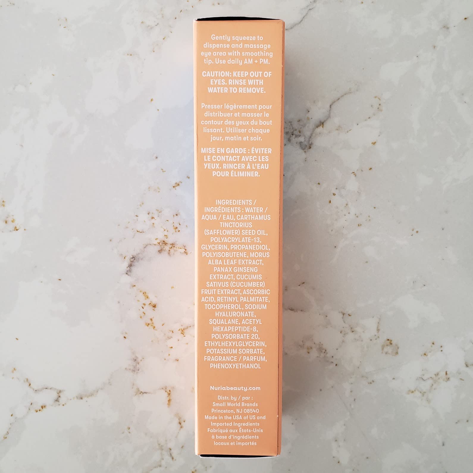 Nuria Defend eye cream packaging box showcases eco-friendly packaging