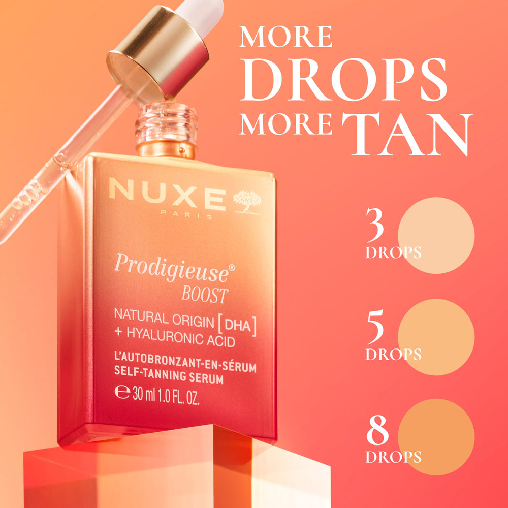 Hands applying the self-tanning serum for an even glow on face