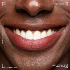 Close-up of creamy texture delivering soft blurred color without heaviness.