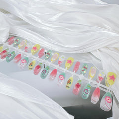 NZRAESTRS beach nails packaging includes file and jelly stickers