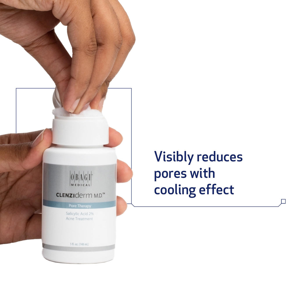 Obagi CLENZIderm M.D. Pore Therapy cotton pad application for cleansing pores.