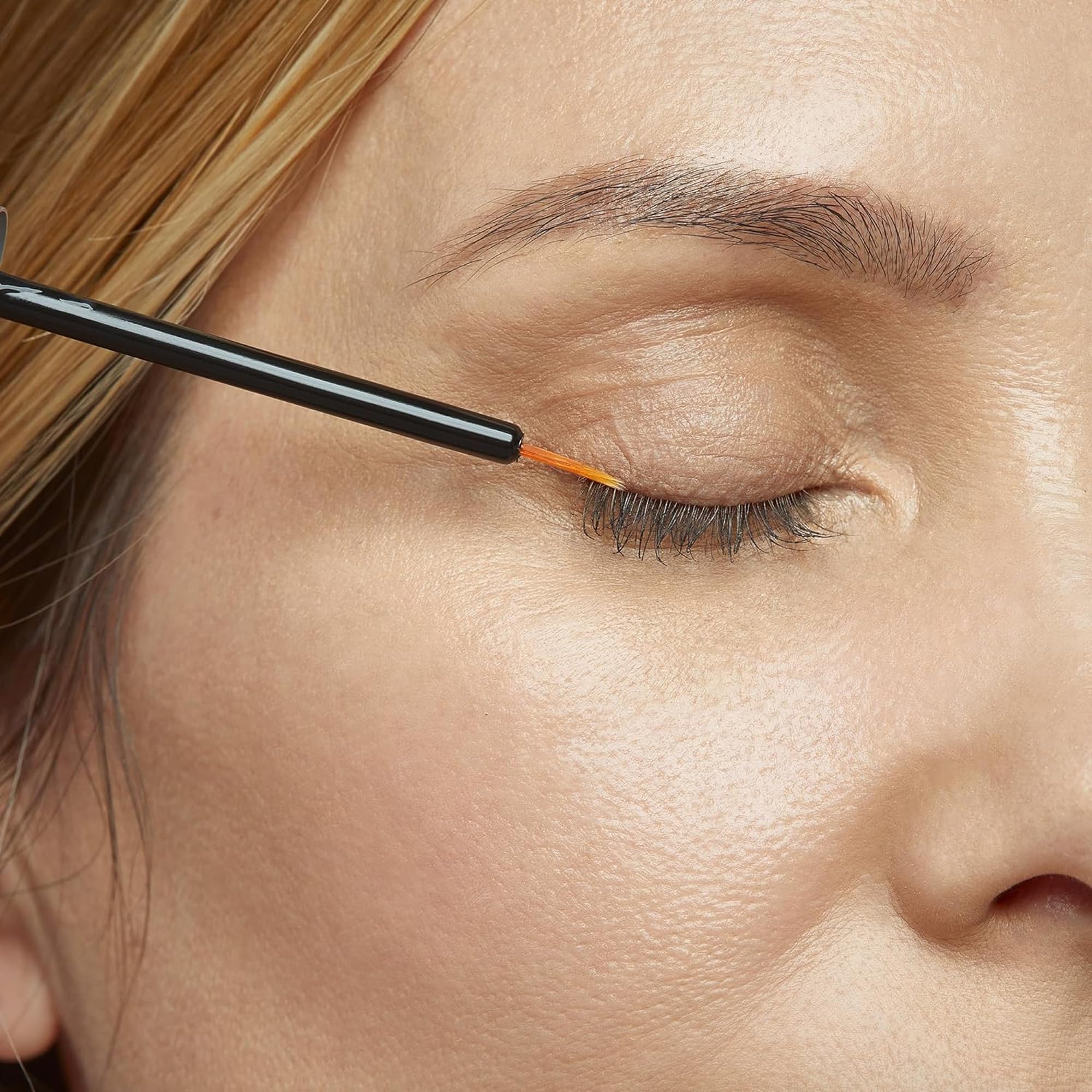 Serum swatches on skin show smooth, even consistency.