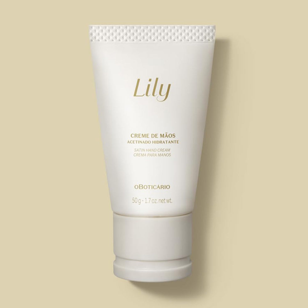 Hands applying Lily Satin Hand Cream highlighting smooth, scented hydration.