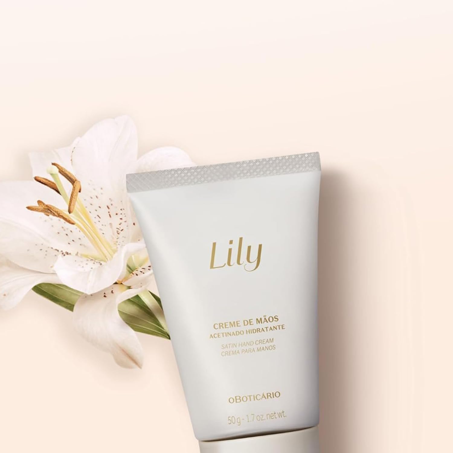 Travel-size Lily Satin Hand Cream tube ready for on-the-go hydration.