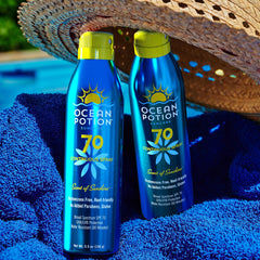 Ocean Potion Sunscreen Body Spray bottle in sunlight showing UV protection concept.