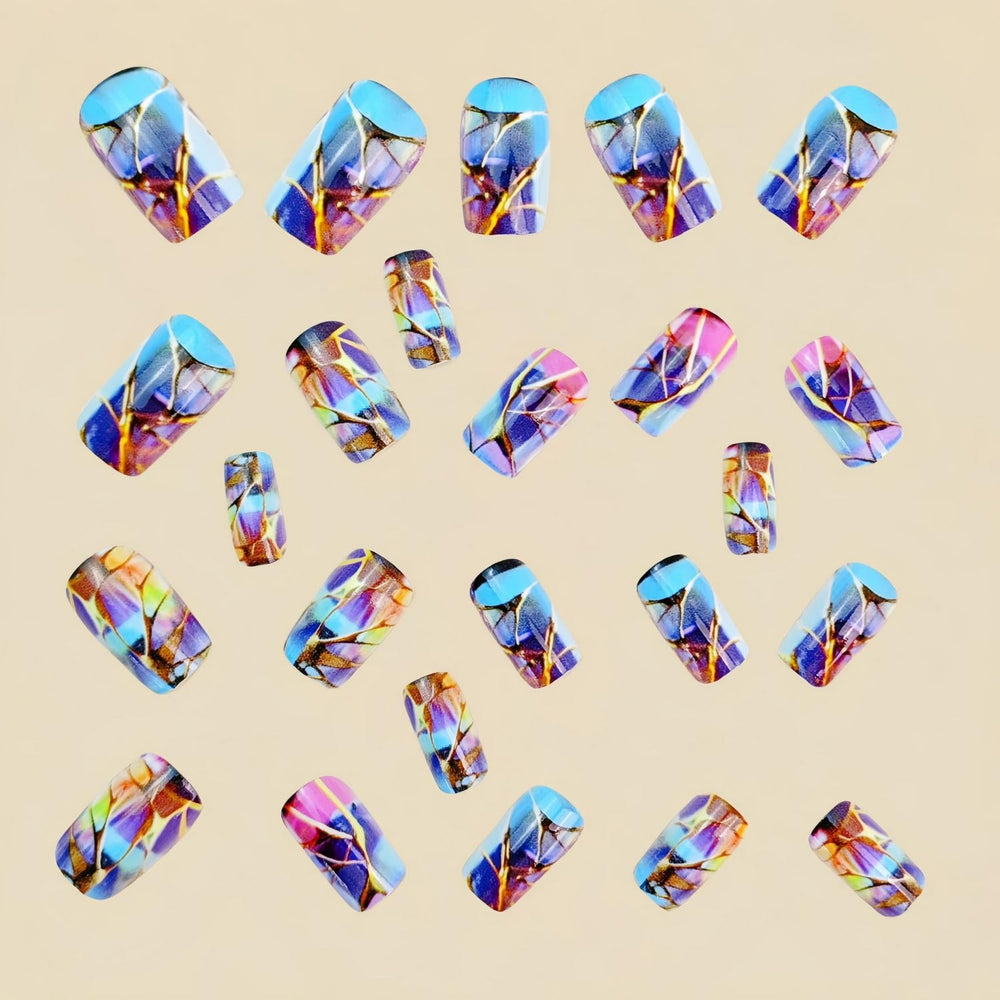 Box of 24 OCOUYVD nails highlighting versatile color assortment.